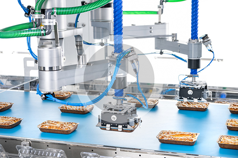 A pick and place machine to individually package various pastry items