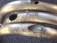 Accelerated wear of pipe bends and receivers